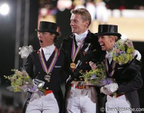 Adelinde Cornelissen, Edward Gal and Anky van Grunsven ecstatic about their kur medals at the 2009 European Championships :: Photo © Astrid Appels