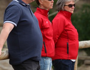 Koch's trainer Soren Vallentin, Danish team trainer Vibeke Degn Andersen and Danish chef d'equipe Rigmor Kristensen watch Kristine Koch ride