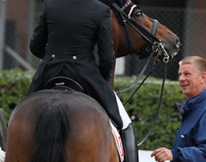 Swiss team coach Michael Deters talks to Anthea Hartmann after her ride on Rubinario
