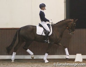 Helen Langehanenberg riding Damon's Delorange over the back and with engagement at the 2012 Global Dressage Forum :: Photo © Astrid Appels