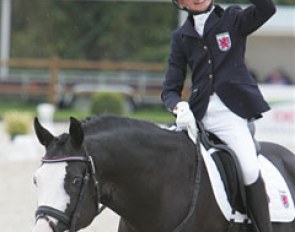 Luxembourg Fabienne Claeys on Domino. She scored 61.895% but looked more happy than most riders do when they get 70%.