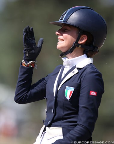 Italian Alessia Volpini waves to the crowds
