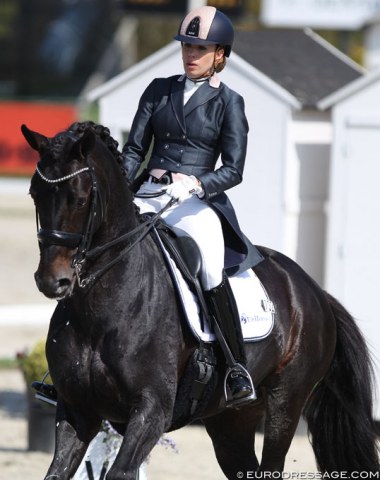 Lynne Maas on the 10-year old KWPN bred Eastpoint (by Westpoint x Negro). The stallion was very distracted and spooky on the short side at C but Maas kept her cool