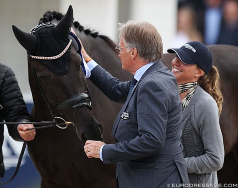 FEI Dressage Committee chair Frank Kemperman pats Queenparks Wendy flanked by her owner Bolette Wandt