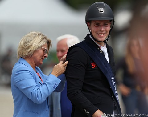 Frederic Wandres gets the Longines sash pinned on. This year there were no medals for the riders! The FEI remarkably changed the protocol to no medals at the request of the riders?? The award ceremony looked a bit lacklustre without gold, silver, bronze