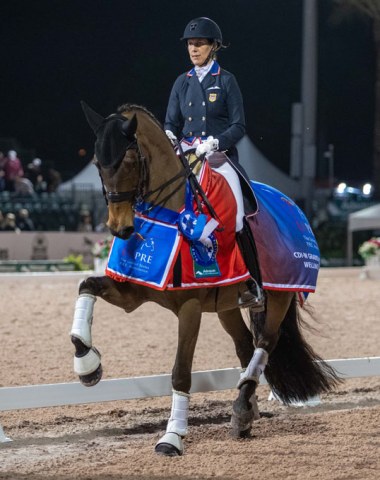 Olivia Lagoy-Weltz and Rassing's Lonoir win the CDI-W Grand Prix Kur to Music under the lights. The class was sponsored by USPRE