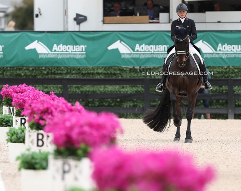 I love these bright pink flowers decorating the arena! Abbelen and Sam Donnerhall about to enter