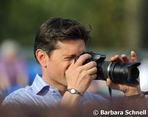 Donnperignon's former owner and rider Christoph Koschel taking pictures of Kasprzak on his "Pepe"