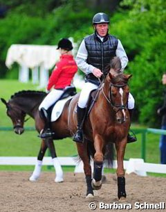 Show jumper Ludger Beerbaum training with the dressage riders