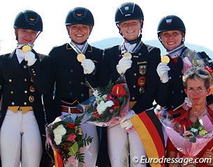 The gold medal winning German team with Claire Averkorn, Anna Christina Abbelen, Bianca Nowag, Vivien Niemann, and chef d'equipe Maria Schierhölter-Otto