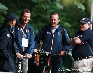 British equestrian team staff members David Buthe and Richard Waygood chat with their American colleagues