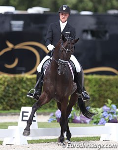 Swedish Jacob Norby Sorensen on Ellegaardens San Droneur (by San Amour x De Noir). The black had an active well engaged trot and canter, but he also kicked to the spur. 