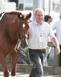 Part-Owner Henk Koers walks Parzival after Adelinde's gold medal winning Grand Prix Special ride at the 2009 European Championships :: Photo © Astrid Appels