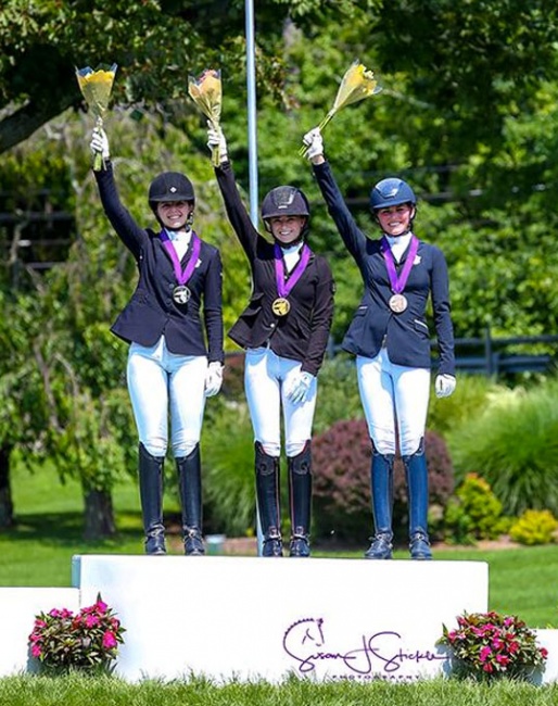 North American Junior Dressage Freestyle medalists from left to right: Bianca Schmidt (silver), Chase Robertson (gold), and Caroline Garren (bronze)  :: Photo © Sue Stickle
