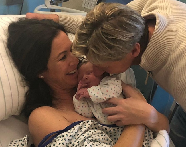 Brand new parents Lyndal Oatley and Patrik Kittel with their baby girl Emilia