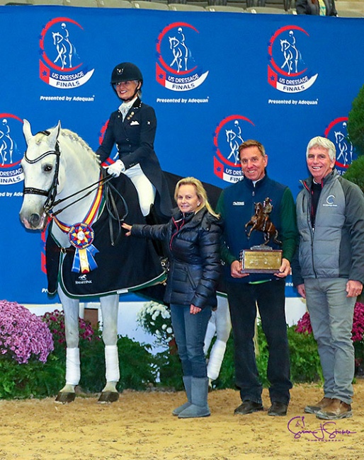 Janne Rumbough and Armas Zumbel are presented with the Calaveras County Perpetual Trophy for the Grand Prix Adult Amateur Freestyle Championship :: Photo © Susan J. Stickle