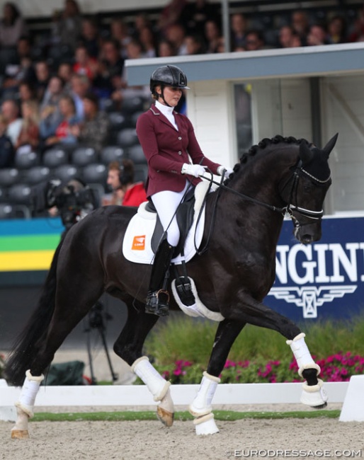 Emmelie Scholtens and Kevin Costner Texel in the 4-year old finals at the 2019 World Young Horse Championships :: Photo © Astrid Appels