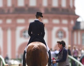 Gina Lutkemeier helping daughter Fabienne get ready to enter the Wiesbaden arena :: Photo © Barbara Schnell