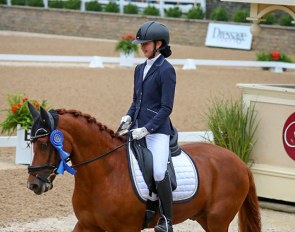Miki Yang and Garden's Sam kick off the children's division with a win in the first round at the 2018 U.S. Dressage Championships :: Photo © Sue Stickle