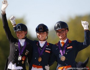 Lia Welschof, Daphne van Peperstraten, Marten Luiten on the Kur Podium at the 2020 European Young Riders Championships :: Photo © Astrid Appels