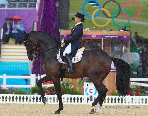 Anna Merveldt and Coryolano in the pouring rain at the 2012 Olympic Games in London :: Photo © Astrid Appels