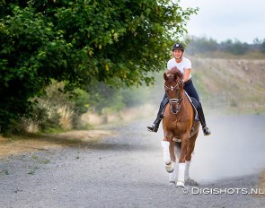 Cathrine Dufour taking Bohemian out for a canter at her yard in Roskilde, Denmark :: Photo © Digishots