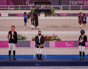 Pepo Puch (AUT) silver, Lee Pearson (GBR) gold, and Georgia Wilson (GBR) bronze on the podium at the Grade 2 Individual medal ceremony at the Tokyo 2020 Paralympics at Equestrian Park :: Photo © Liz Gregg