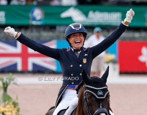 Charlotte Jorst celebrates a world cup victory at the 2022 CDI-W Wellington :: Photo © Lily Forado