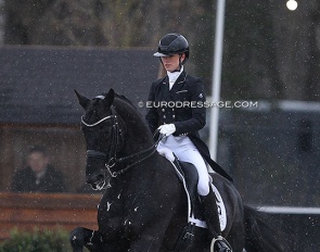 Charlotte Fry and Glamourdale canter in the wet snow to a personal best at the 2022 CDI Opglabbeek