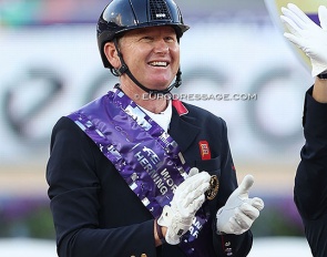 Gareth Hughes on the podium for team silver at the 2022 World Championships Dressage :: Photo © Astrid Appels