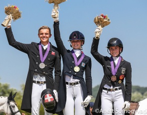 The Kur podium with Helgstrand, Pidgley, Lang at the 2023 European Young Riders Championships :: Photo © Anett Somogyvari