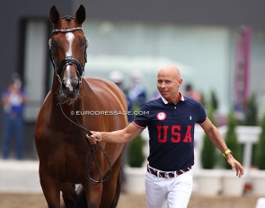 Steffen Peters trotting up Suppenkasper at the 2021 Tokyo Olympics. The only U.S. pair seemingly left in the running for the 2024 Olympics :: Photo © Astrid Appels 