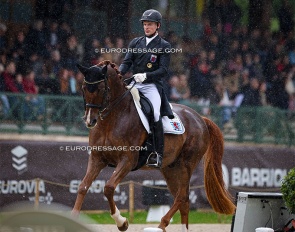 Nicolas Wagner and Quater Back Junior in the pouring rain at the 2024 CDIO Compiegne :: Photo © Astrid Appels