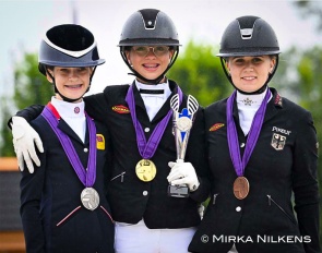 The individual test podium at the 2024 European Pony Championships: Gray, Tillmann, Clauberg :: Photo © Mirka Nilkens