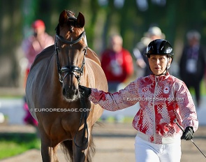 Long-time Canadian team rider Jill Irving trotting up Genesis as team reserve horse at the 2024 Olympics :: Photo © Astrid Appels