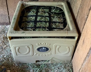 A hay feeder yielded better results than an activity ball or mirror