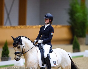 Lotta Beckmanns and Dragon Kiss at their CDI debut at the 2022 CDI Kronenberg Indoor :: Photo © Astrid Appels
