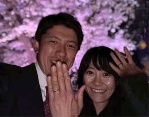Shingo Hayashi and Sayo got engaged. Posing in front of a Japanese cherry tree in full bloom