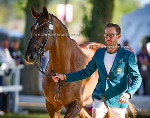 Jayden Brown trotting up Quincy B at the 2024 Paris Olympic Games :: Photo © Astrid Appels