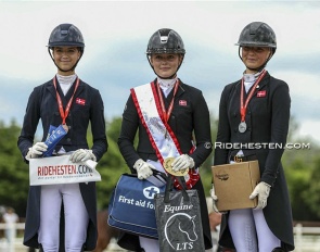 The junior podium with Qvist, Schoubye and Bøllingtoft as medallists at the 2025 Danish Junior/Young Riders Championships :: Photos © Ridehesten