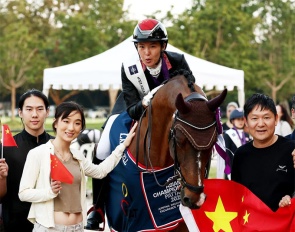 Sarah Rao of China riding Geniaal celebrates winning gold during the Intermediate I Dressage individual championship at the Thai Polo Club on November 27, 2025 in Pattaya (THA) :: Photo © FEI/Yong Teck Lim