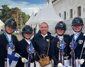 Terhi Stegars (center) with the Finnish young riders at the 2026 Nordic Baltic Championships 