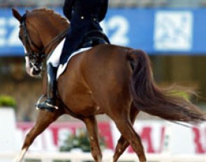 Nadine Capellmann and Farbenfroh Ace in the Grand Prix at the 2002 WEG :: Photo © Mary Phelps