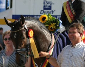 Jana Freund wins the 2004 Bundeschampionate with Sandro Classic. Owner Josef Wilbers smiles :: Photo © Astrid Appels
