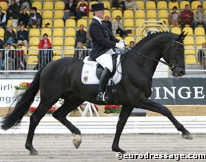 Anja Engelbart and Rosario at the 2004 World Young Horse Championships. The moment when Rosario bit his tongue :: Photo © Astrid Appels