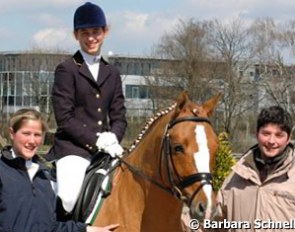 Junior Rider Marion Engelen, Bernice Hoogen on Dornik Double and Isabell Werth's groom and bereiter Rocco di Piero