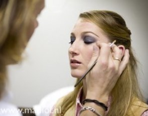 Marlies van Baalen getting her make-up done
