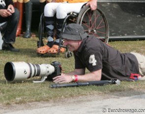 Digishots' Leanjo de Koster going all the way to shoot a small Jack Russel Terrier