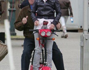 Gabi Winkelhues and show director Uwe Spenlen share a scooter ride.