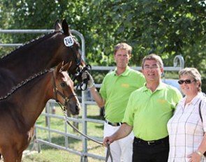 Uwe Brandes and his family with mare and foal. Brandes bred the 2010 Filly Champion